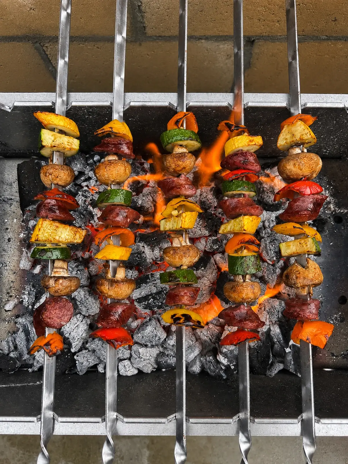 Sausage & Veggie Skewers on a grill